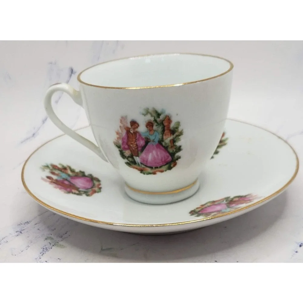 Vintage Porcelain Tea Cup and Saucer White w/Gold Trim and Dancing Couple